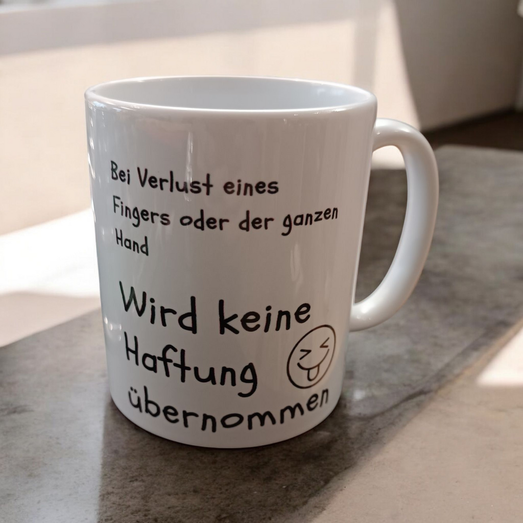 Tasse „Bitte nicht füttern – Keine Haftung“